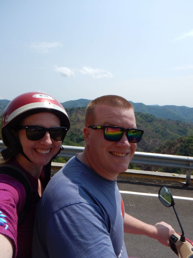 Mae Salong in Northern Thailand Jen and Stevo on a motorbike smiling at the camera