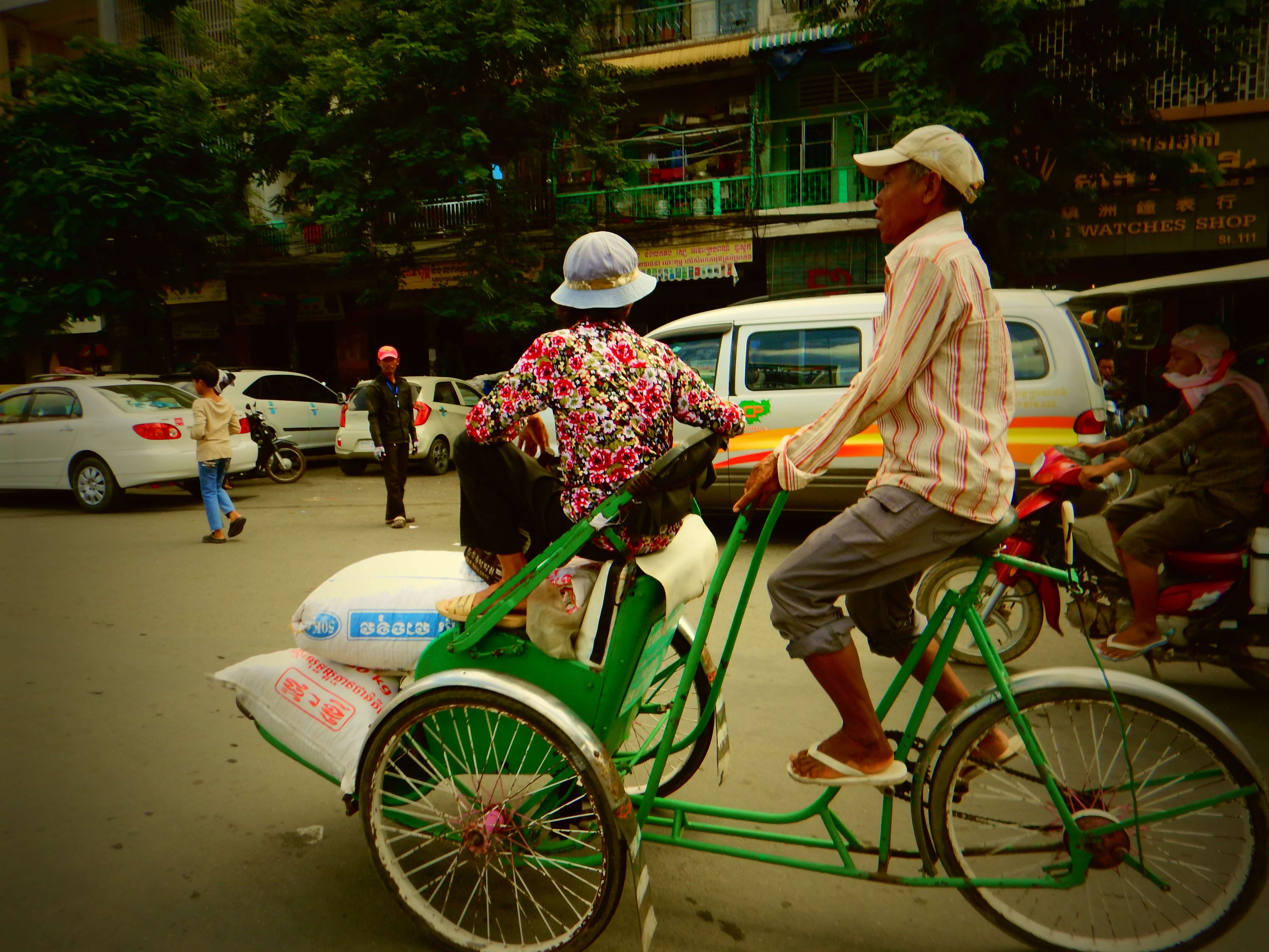 Cyclos are the original Cambodia taxi