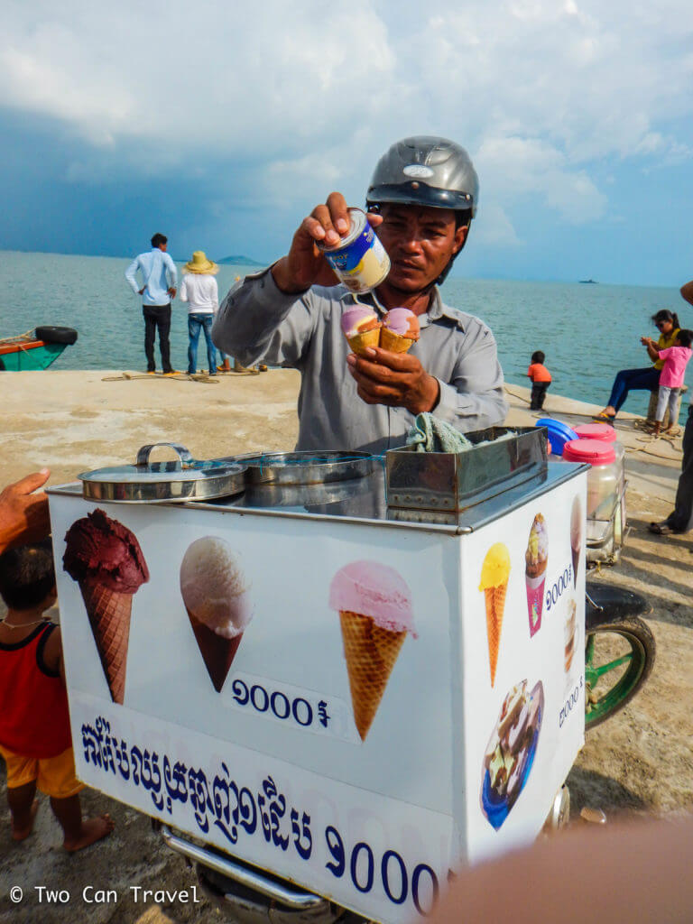 An ice cream vendor near the boats for Rabbit Island, Cambodia. Rabbit Island is an easy day trip from Kep, Cambodia. 