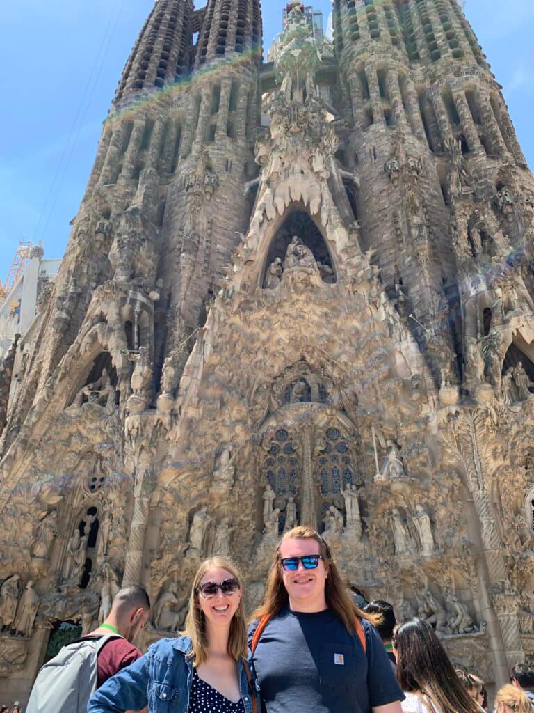 Gaudi Buildings in Barcelona Jen and Stevo standing in front of the Nativity facade of the Sagrada Familia