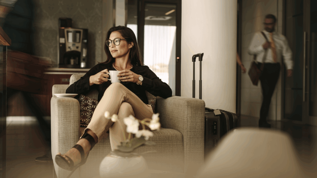 A woman enjoying an airport lounge thanks to Priority Pass